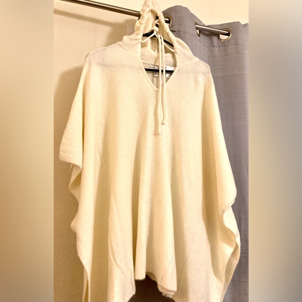 Off white hooded woolen poncho.